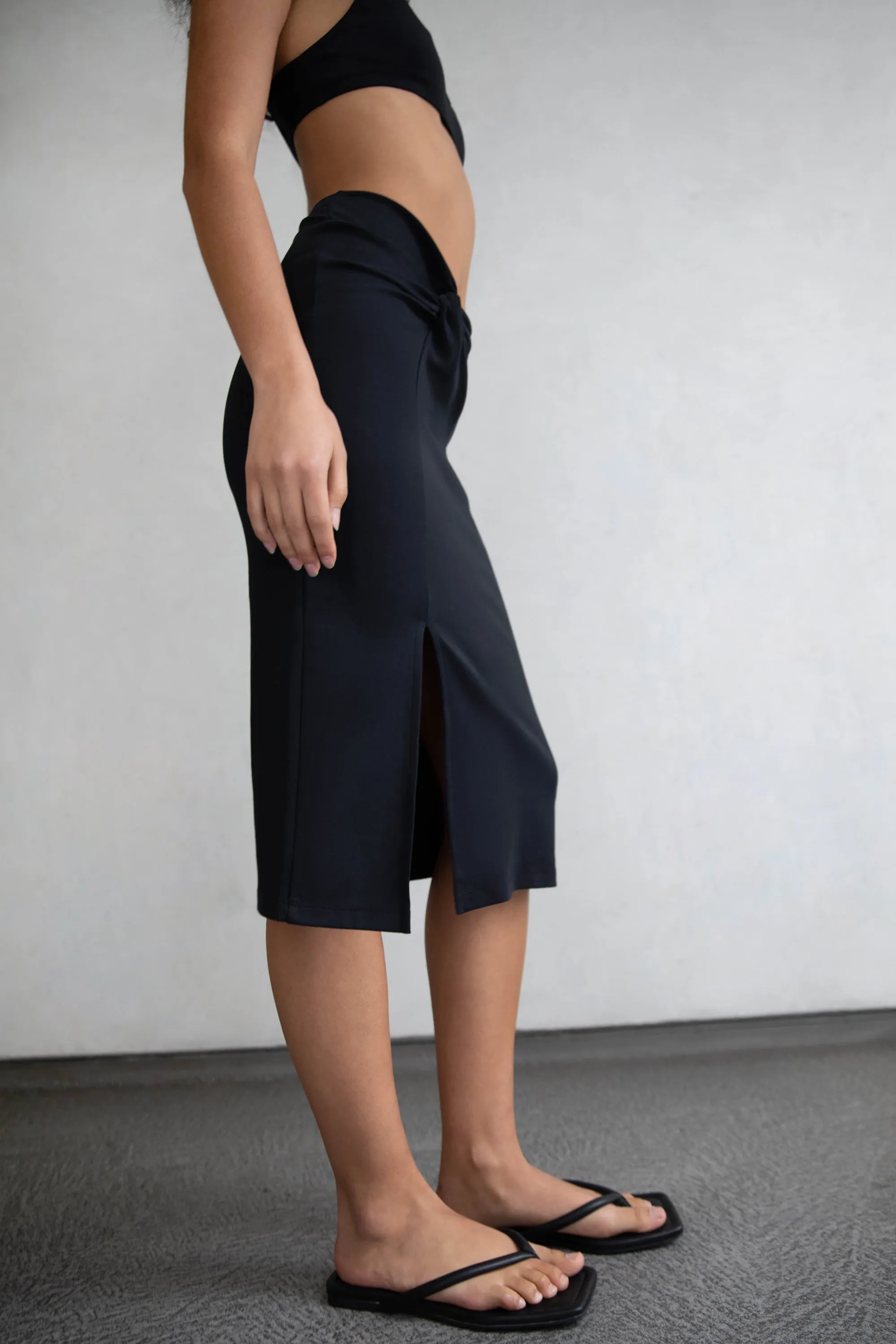 FRONT TWIST MIDI SKIRT